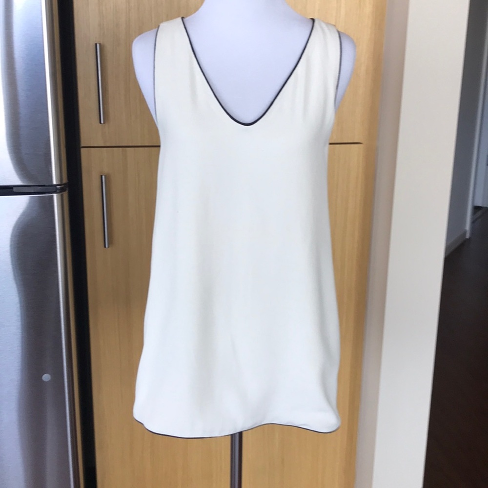 Zara basic collection tank with black piping.